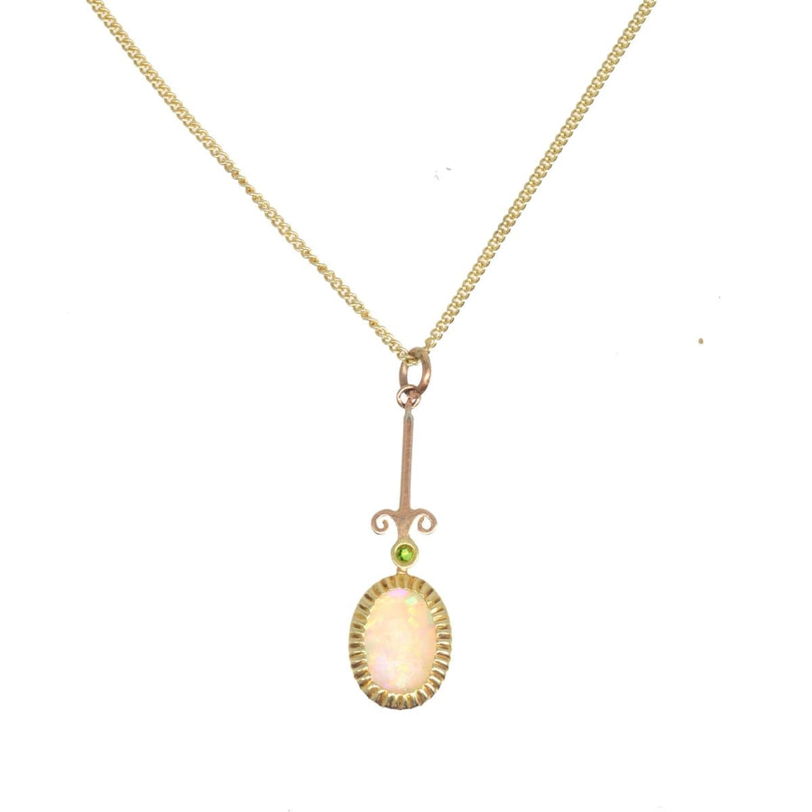 Edwardian opal and green garnet pendant on modern 9ct gold chain, showcasing fine craftsmanship and vintage elegance.