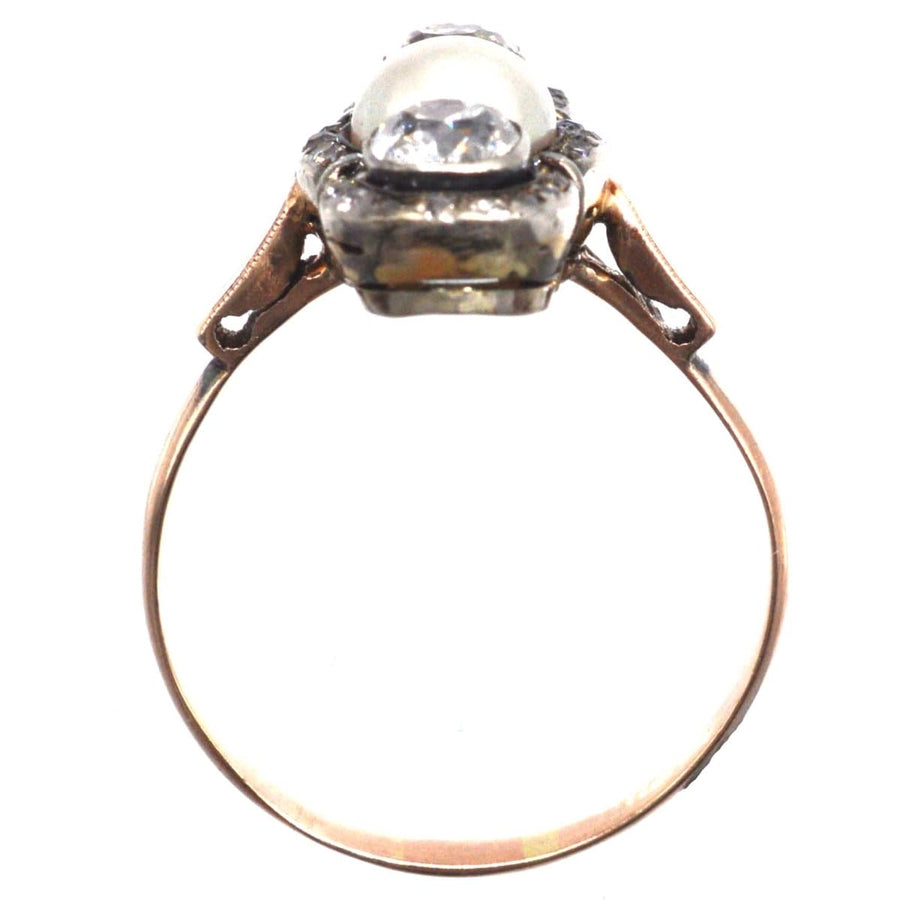 Edwardian silver and 15ct gold three stone ring with old mine cut diamonds and natural pearl, circa 1905.