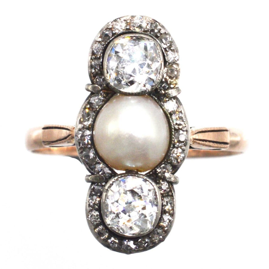Edwardian three stone ring featuring old mine cut diamonds and a natural pearl, circa 1905, vintage jewelry.