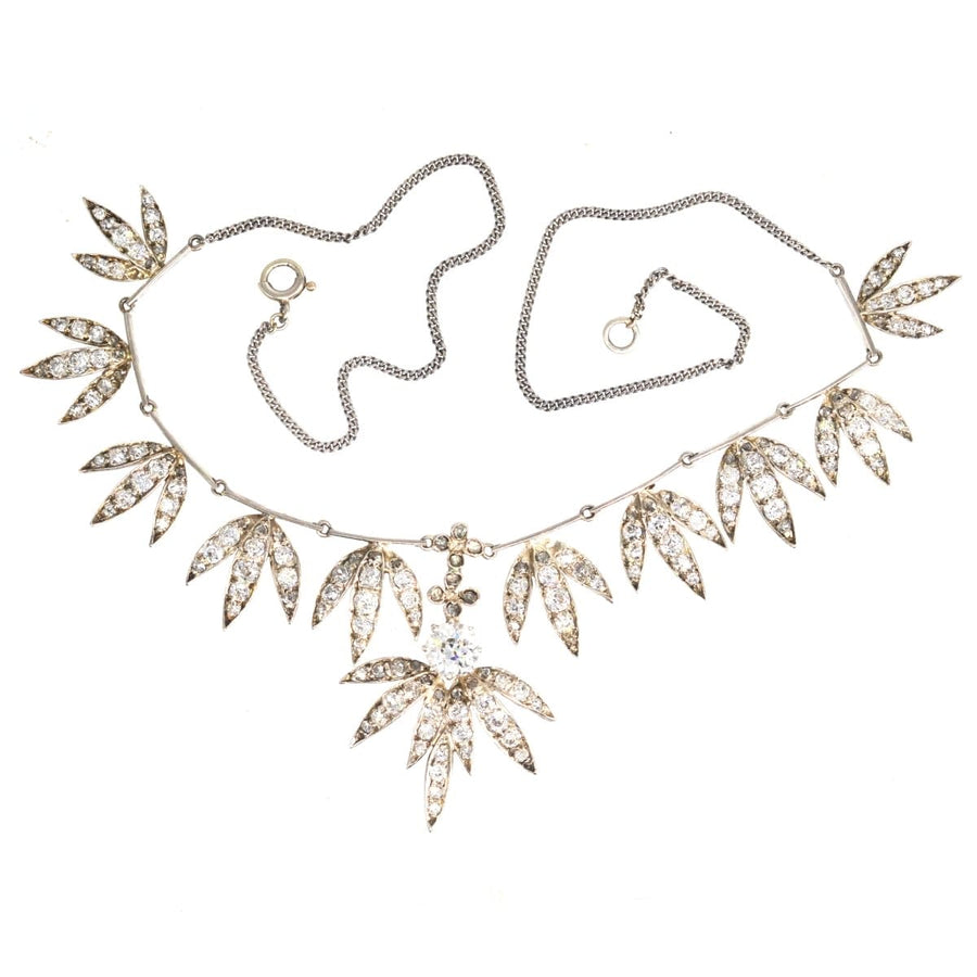Edwardian silver and platinum diamond semi-fringe necklace with ten diamond fronds and a striking diamond centerpiece.