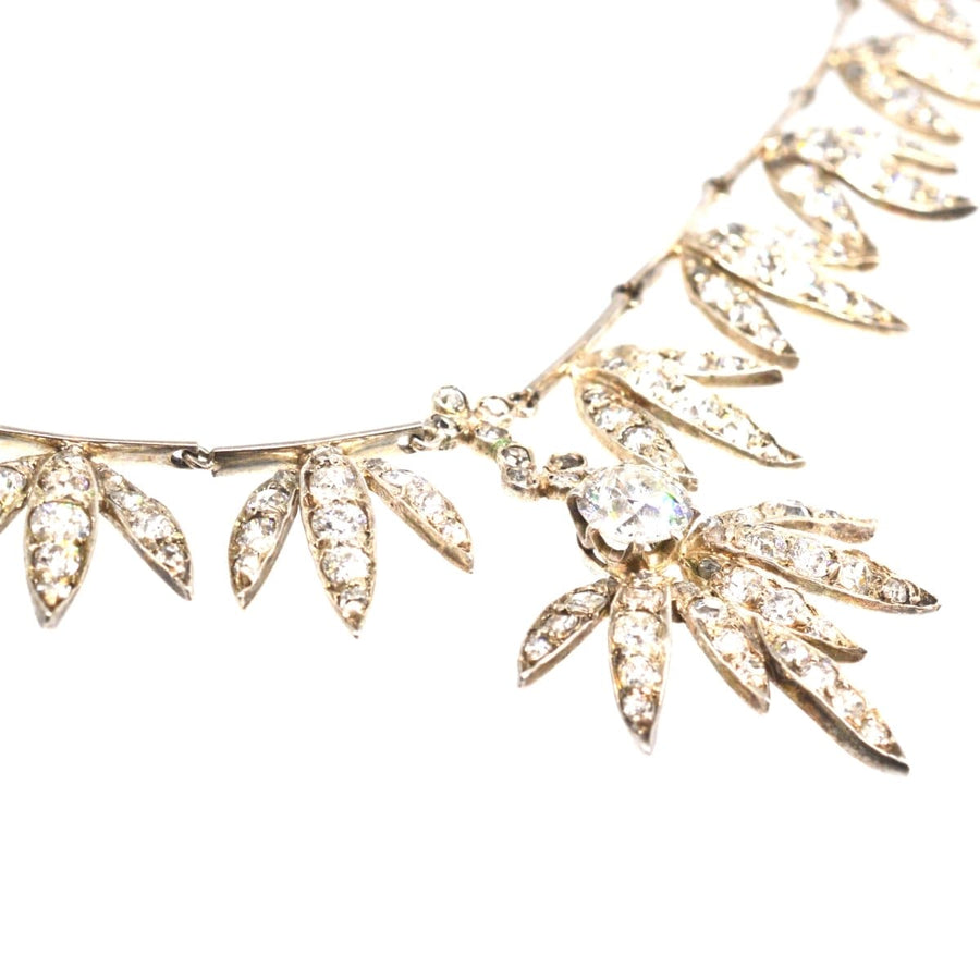 Edwardian silver and platinum diamond semi-fringe necklace with 10 diamond fronds and a stunning 1 carat centerpiece.