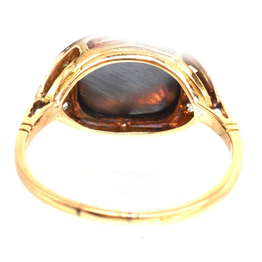 Art Deco 18ct gold and platinum ring showcasing a unique hematite stone, perfect for engagement or antique jewelry collection.