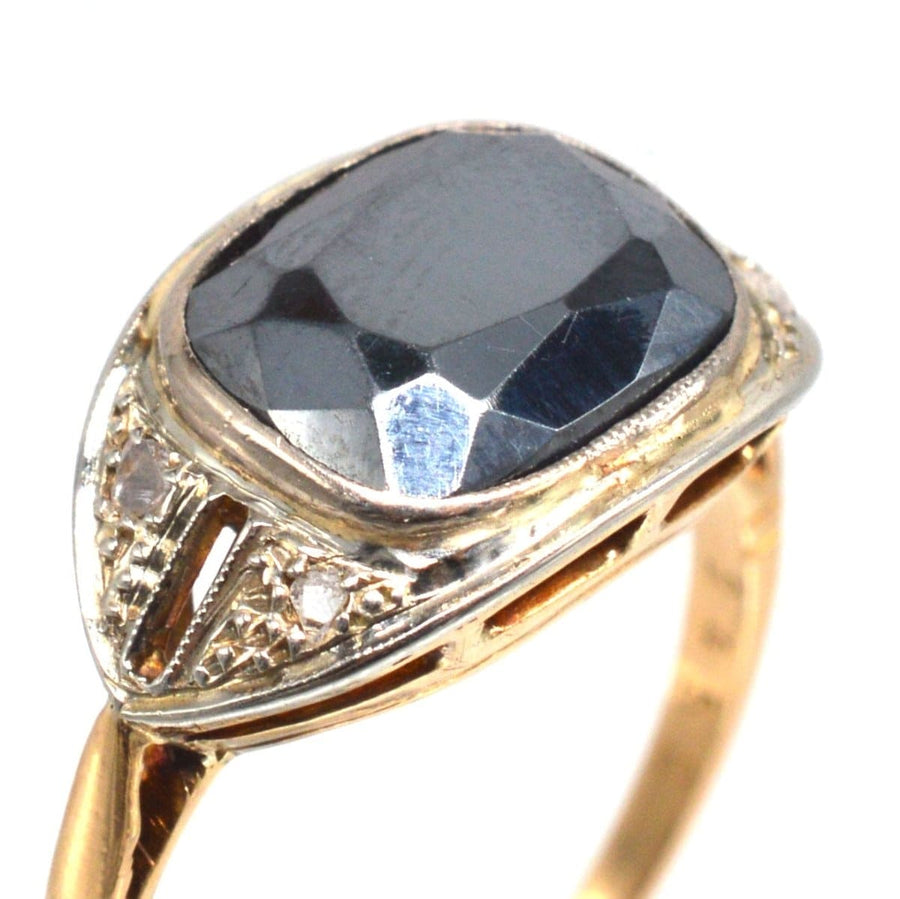 French Art Deco 18ct gold and platinum ring featuring a unique hematite stone and diamond accents.