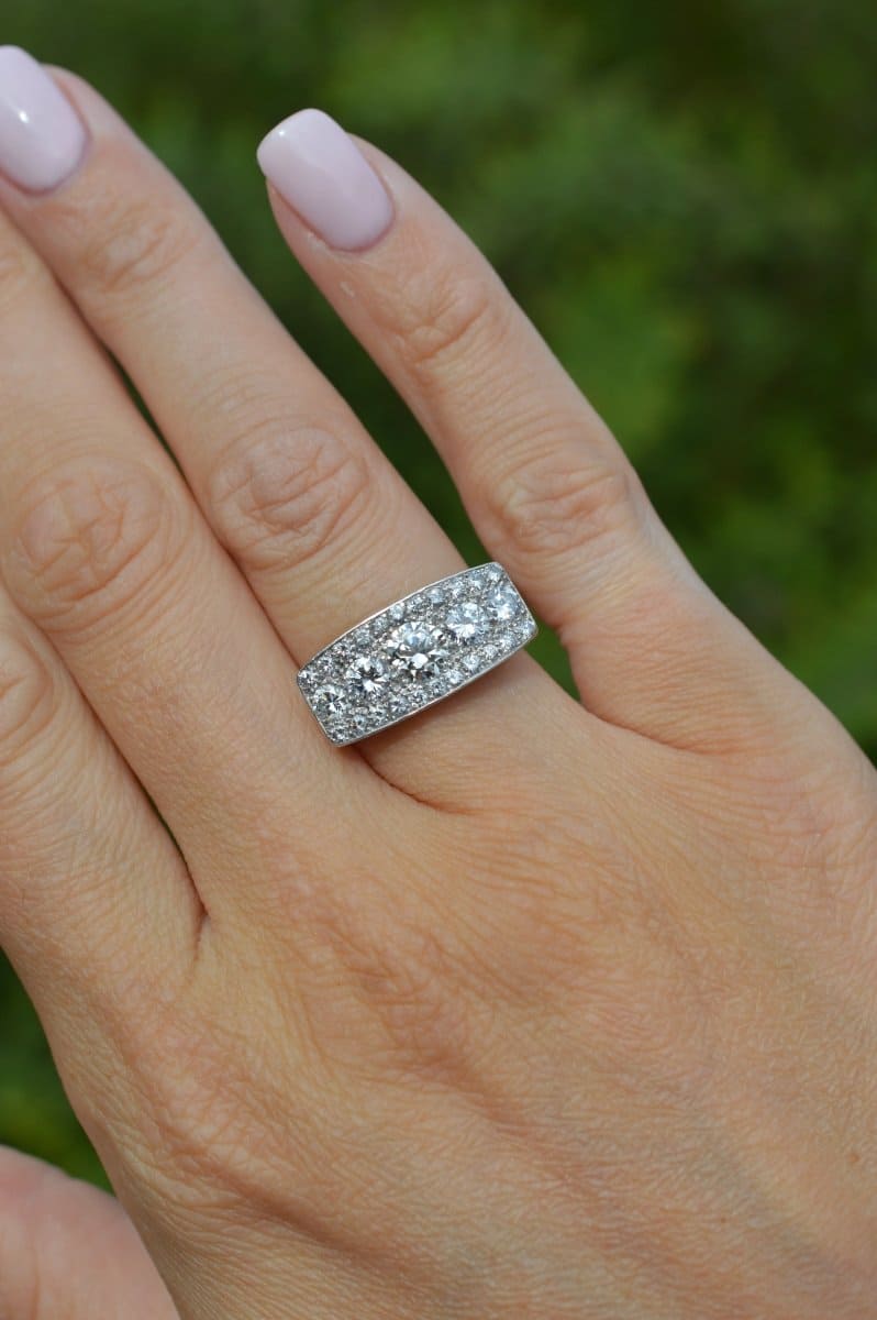 Elegant French Art Deco platinum and diamond ring with over 2 carats of sparkling diamonds on display.