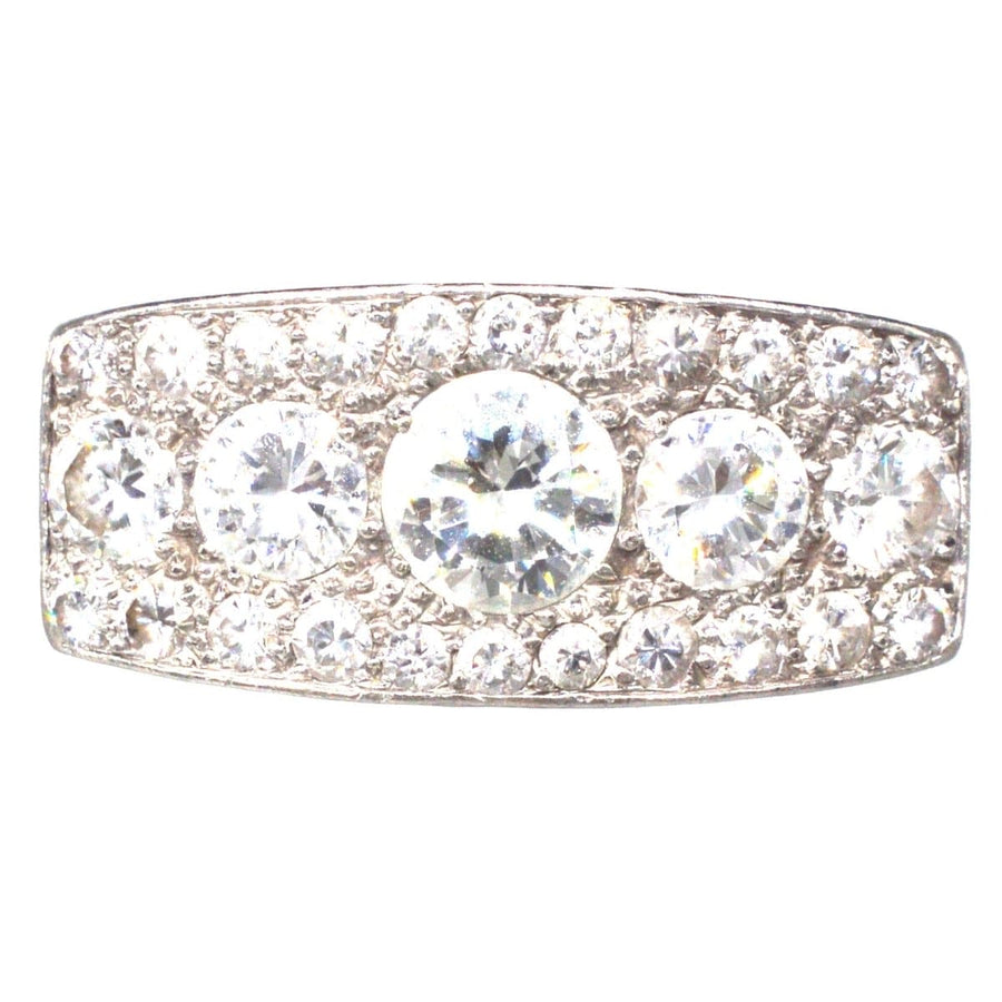 French Art Deco platinum ring featuring over 2 carats of diamonds in a chic, elegant design.