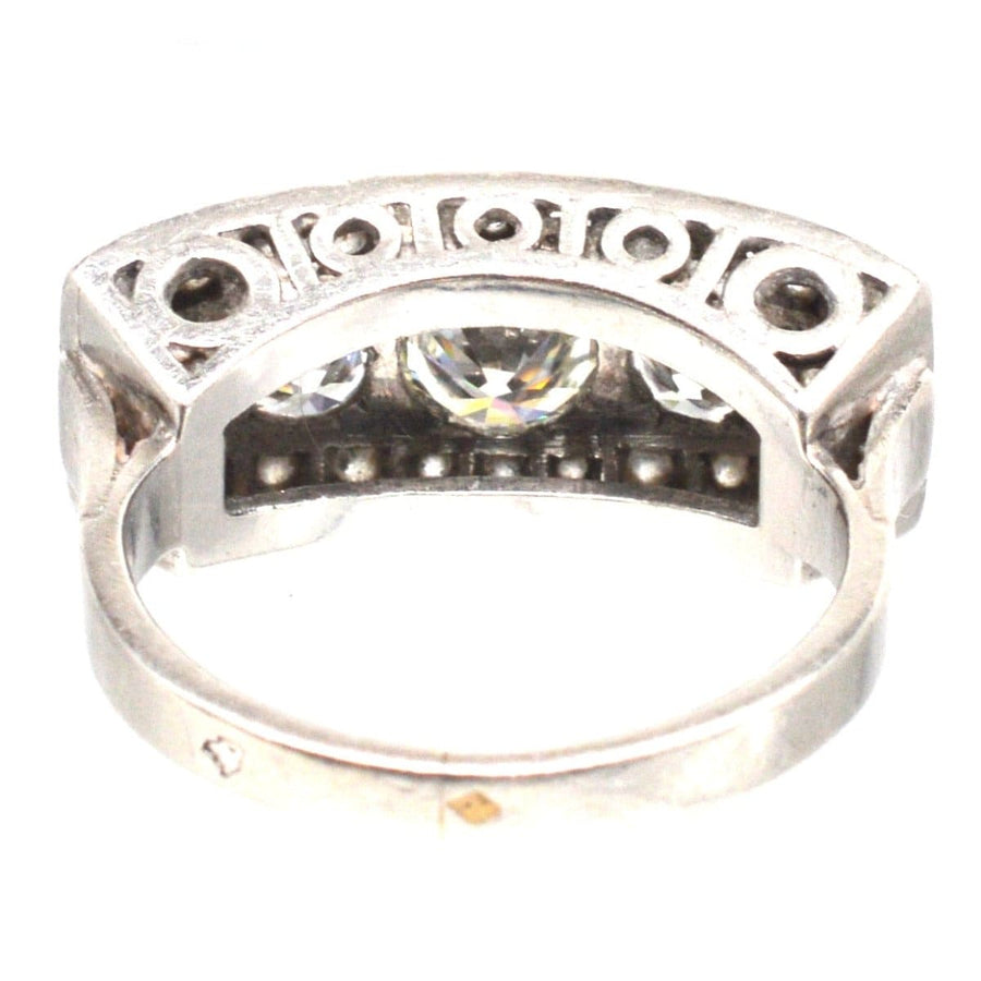 French Art Deco platinum ring featuring over 2 carats of diamonds with a chic and impressive design.