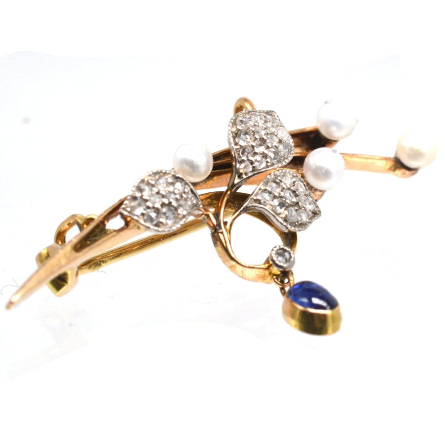 French Art Nouveau 14ct gold brooch with pearls, diamonds, and a cabochon sapphire drop.