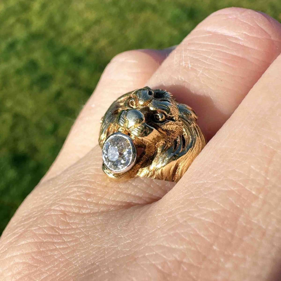 18ct gold lion ring with diamond, showcasing detailed artistry and majestic roaring expression.