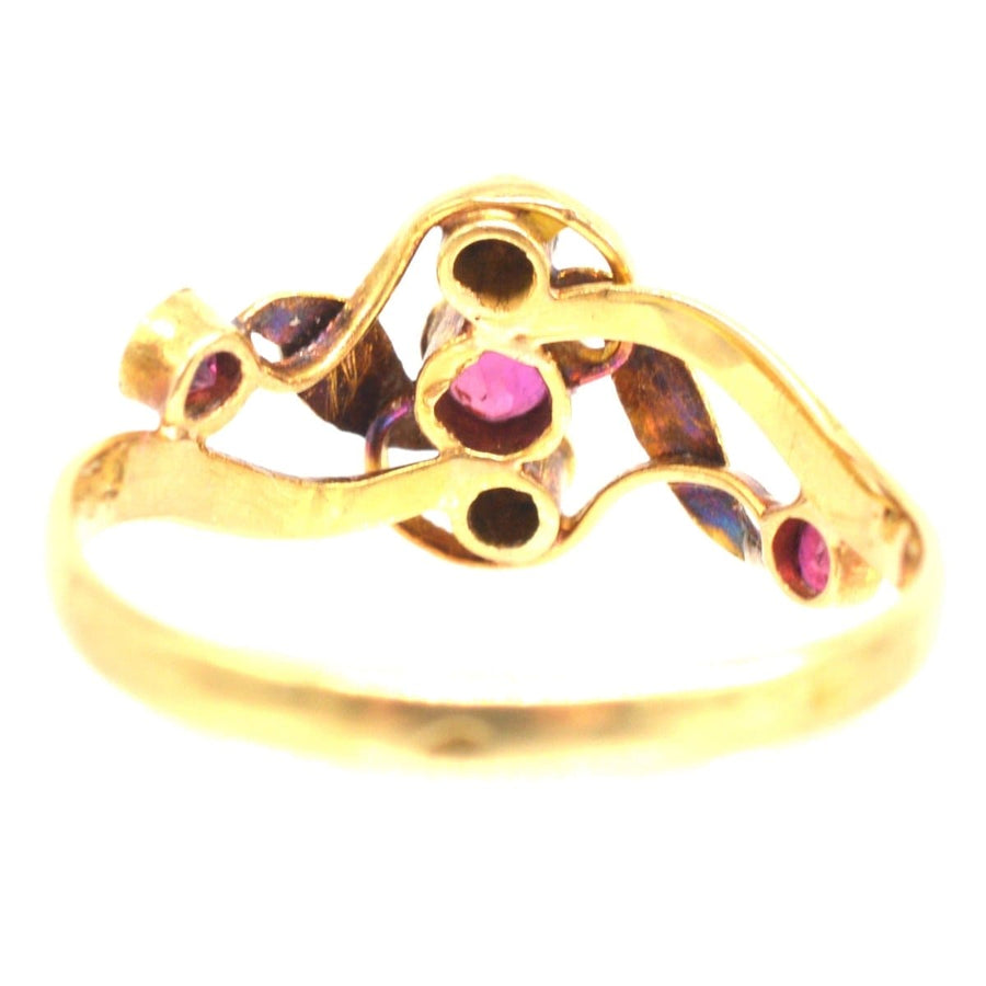 French Art Nouveau 18ct gold ring featuring rubies and pearls in a naturalistic design.