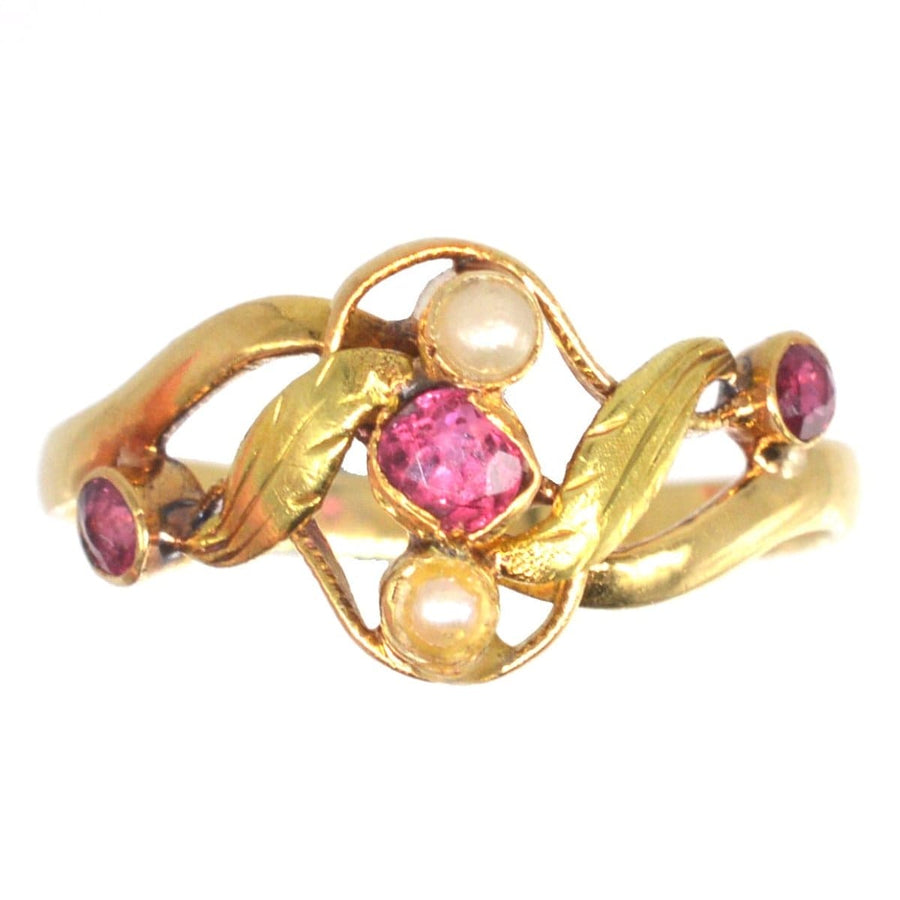 French Art Nouveau 18ct gold ring featuring rubies and pearls in a naturalistic design, perfect for engagement or July birthdays.