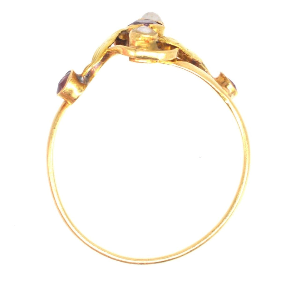 French Art Nouveau 18ct gold ring featuring rubies and pearls in a naturalistic design.