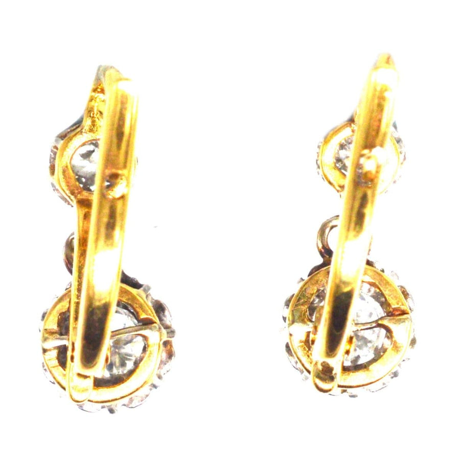 French Belle Epoque 18ct Gold and Platinum Diamond Drop Dormeuse Earrings with elegant claw settings.