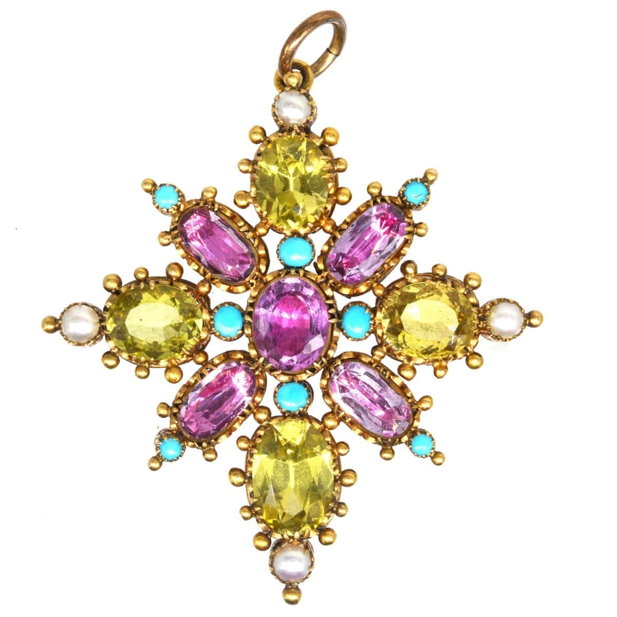 Georgian gold pendant featuring pink topaz, chrysoberyl, split pearl, and turquoise in a floral design.