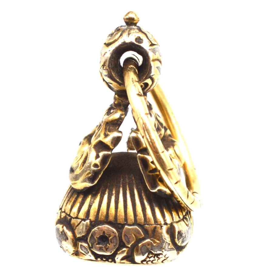 Georgian gold cased seal with intricate repousse design and split ring, featuring two doves and the word LOVE.