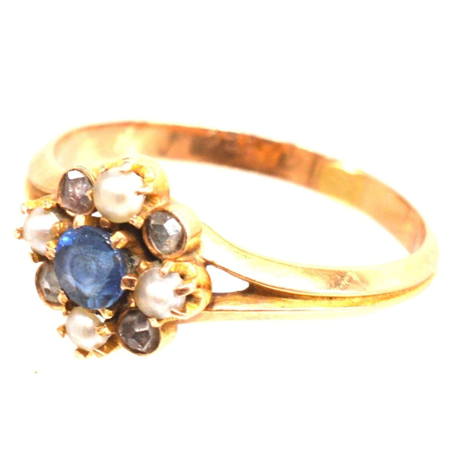 Antique Late 19th Century French 18ct Gold ring featuring sapphire, pearl, and diamond accents, circa 1890s.