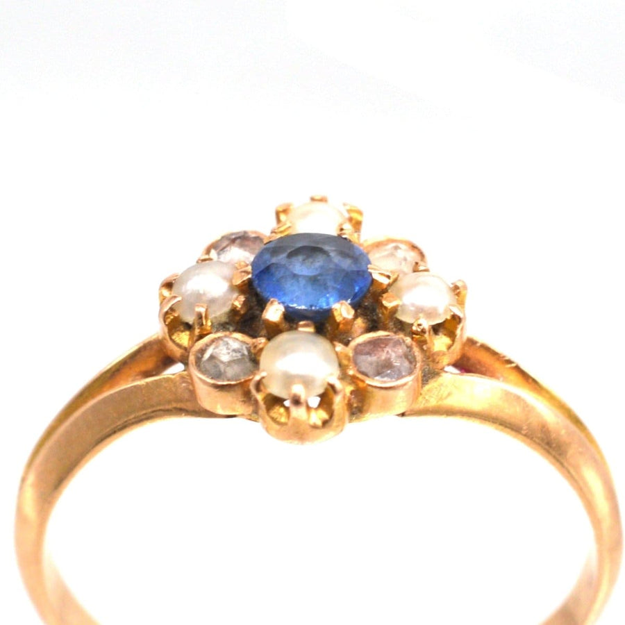 Antique late 19th century French 18ct gold ring featuring sapphire, pearls, and rose cut diamonds.