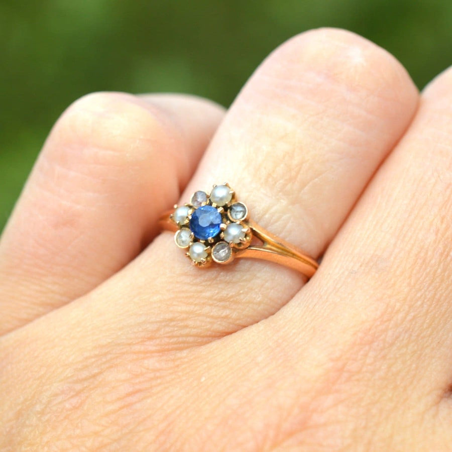 Late 19th Century French 18ct gold ring featuring sapphire, pearl, and diamond accents, circa 1890s.