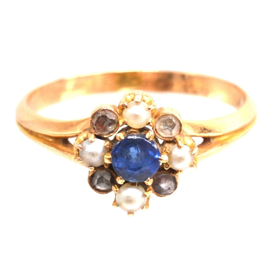 Late 19th Century French 18ct gold ring featuring sapphire, pearl, and rose cut diamond accents.