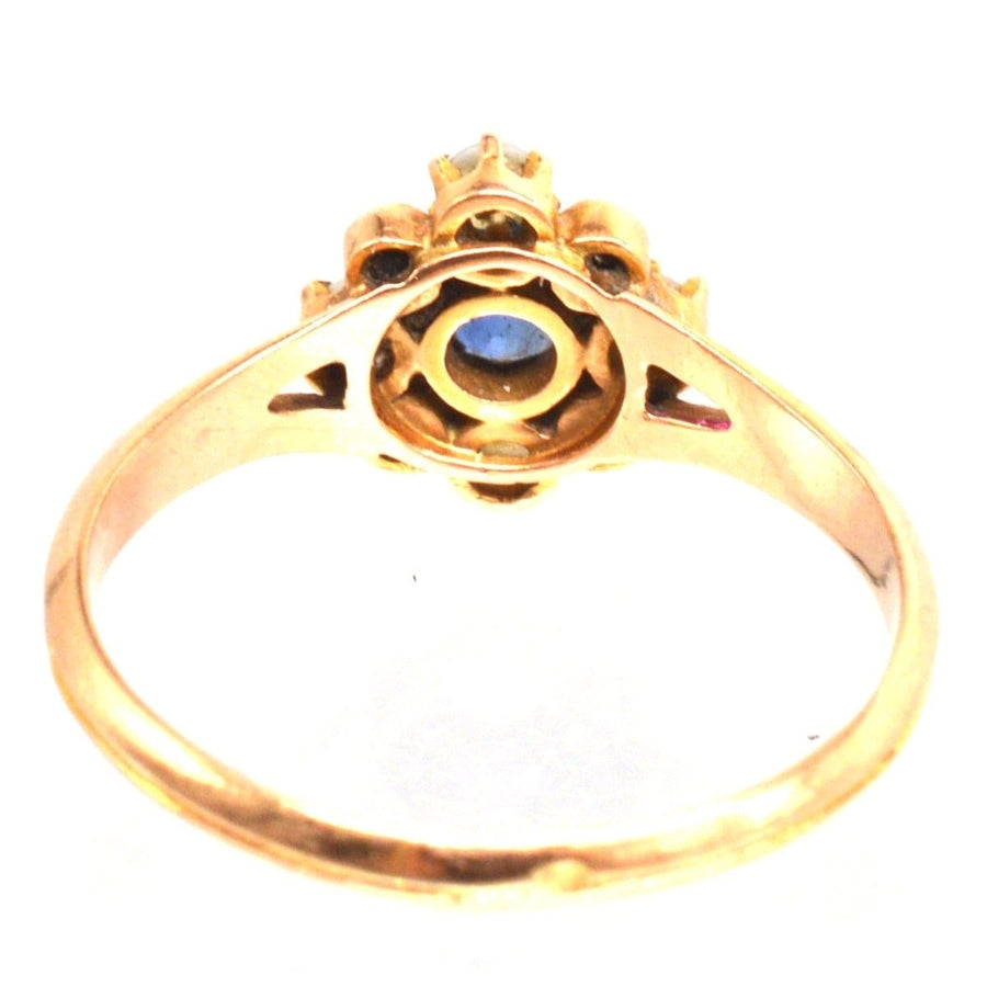 Late 19th Century French 18ct gold ring featuring sapphire, rose cut diamonds, and split pearls, circa 1890.