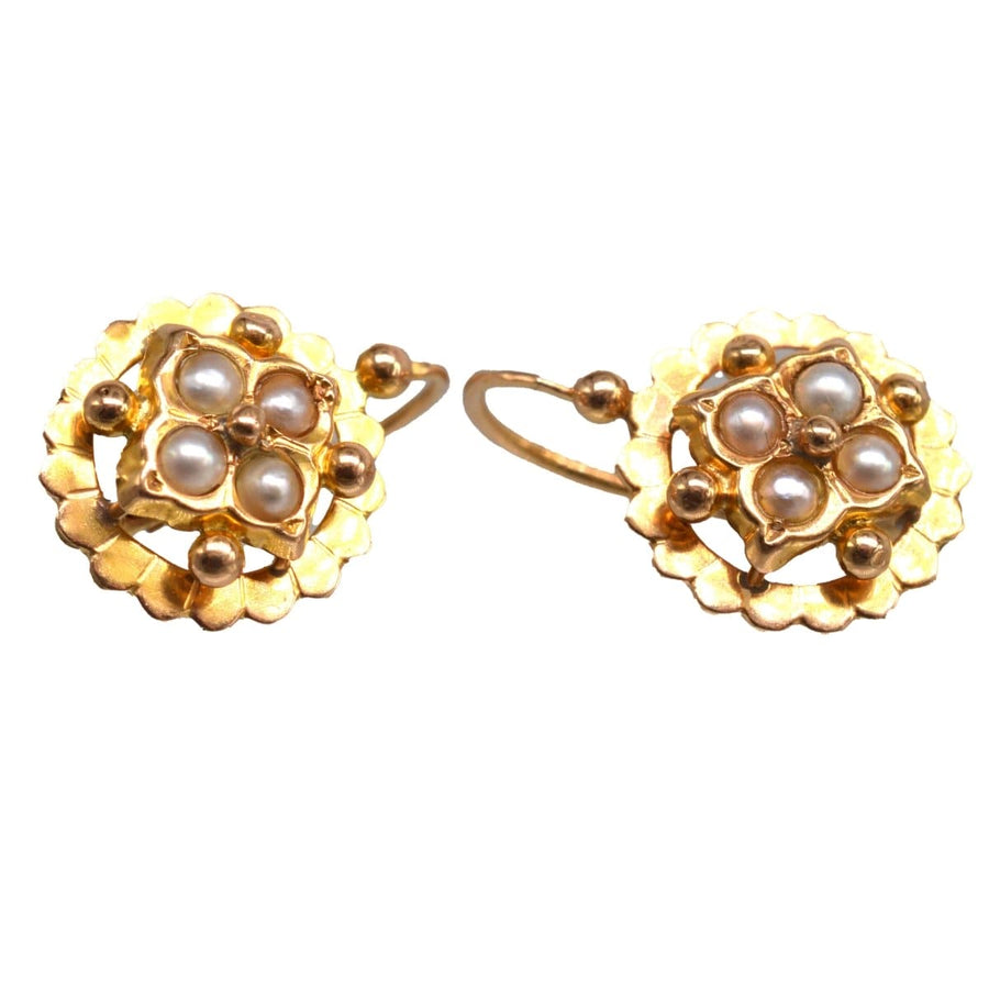 Late 19th century gold dormeuse earrings featuring clusters of split pearls, a classic French design.