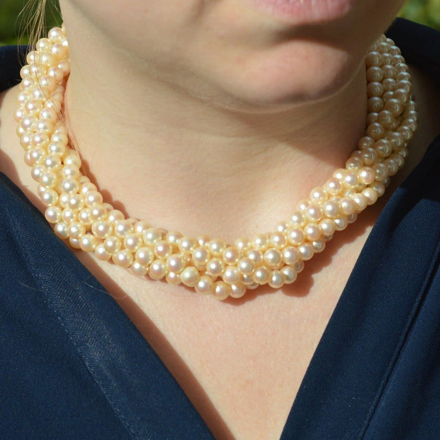 Mid-century cultured pearl torsade necklace worn, showcasing elegant layers and texture, perfect for any occasion.