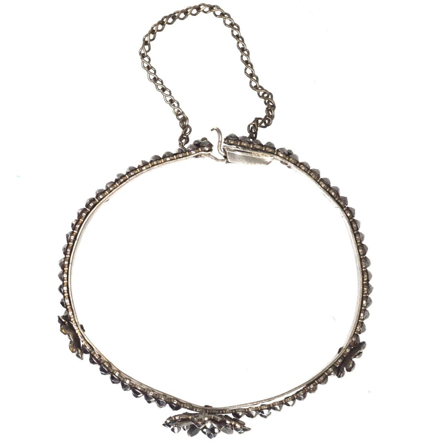 Regency Cut Steel Bangle featuring floral designs and intricate rose diamond replication, elegant vintage jewelry.