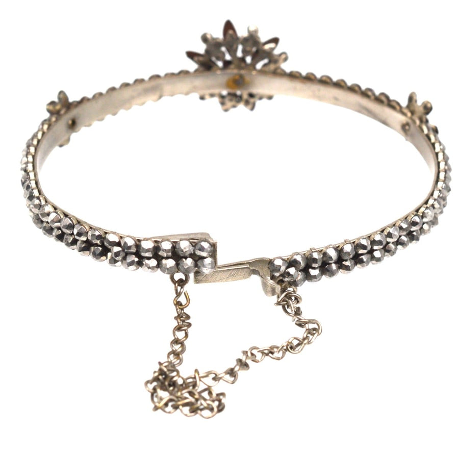 Regency Cut Steel Bangle showcasing flowers and rose diamonds, an elegant bracelet from the early 19th century.