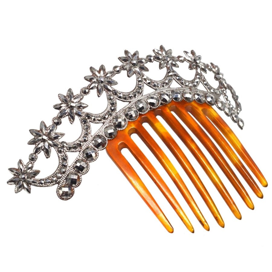 Regency cut steel tiara with stars, tortoiseshell comb featuring exquisite craftsmanship and intricate design.