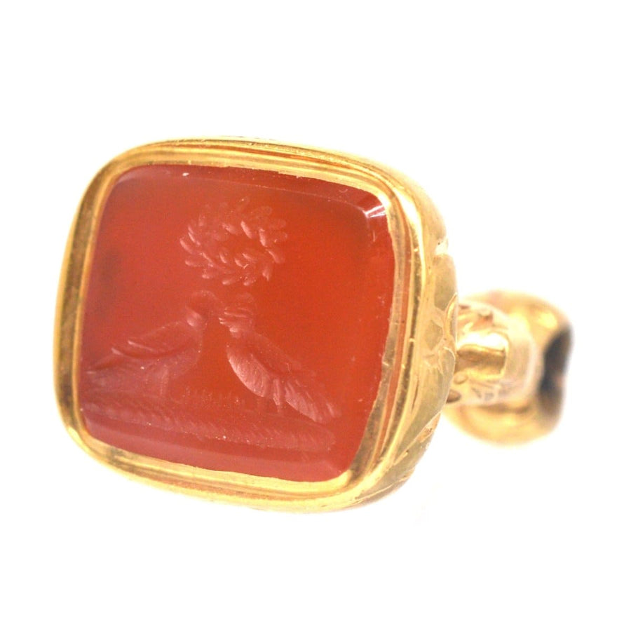 Regency gold cased seal with carnelian intaglio of two doves kissing under a love wreath.