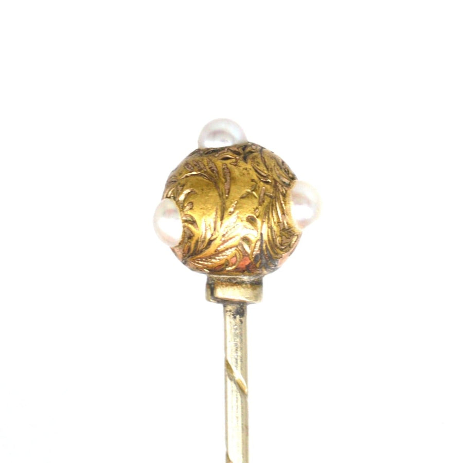 Regency pearl and gold ball tie pin with engraved leaves, perfect for silk ties or cravats, dating 1820s-1840s.