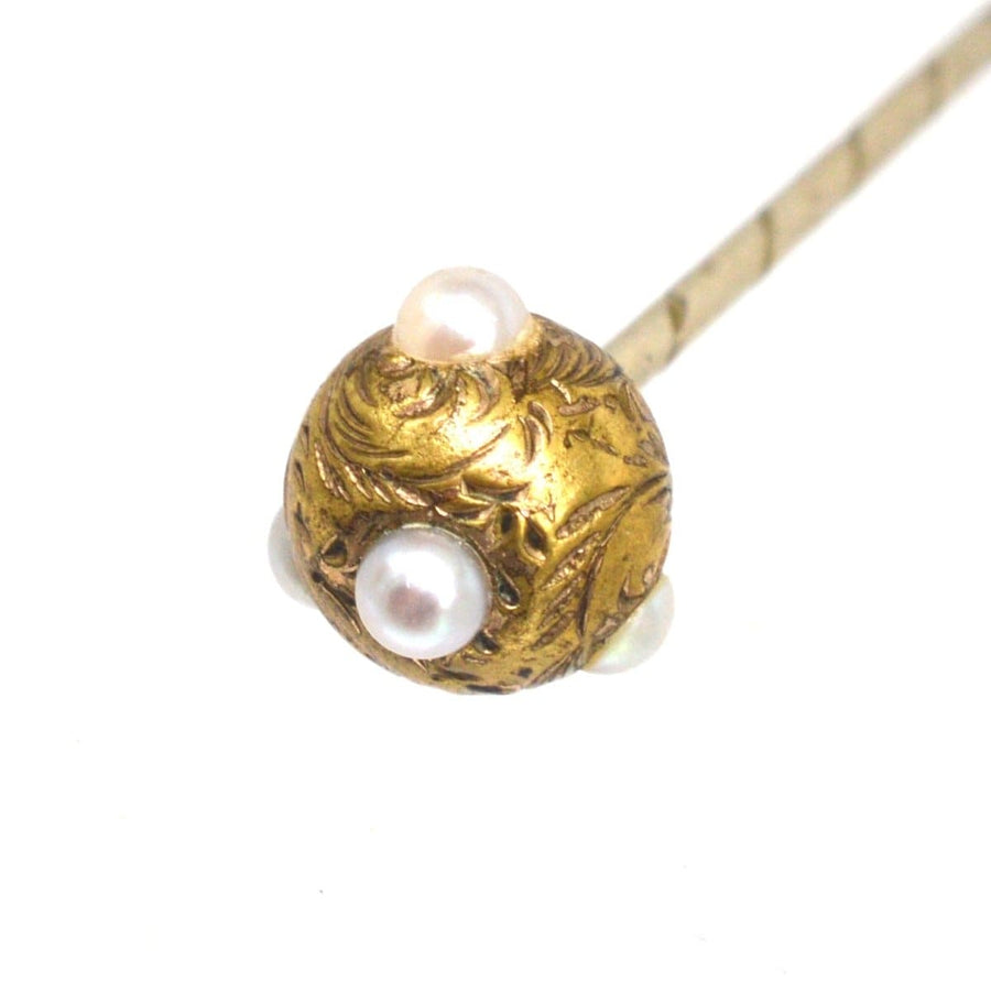 Regency pearl and gold ball tie pin with engraved leaves, perfect for enhancing a silk tie or cravat.
