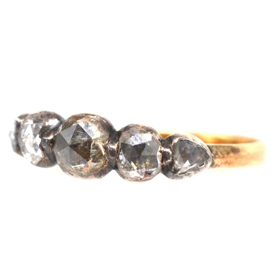 Regency silver and gold five stone rose cut diamond ring, showcasing antique elegance and unique design.