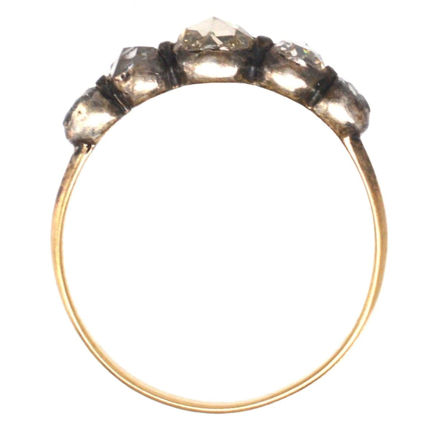 Regency silver and gold five stone rose cut diamond ring, showcasing antique elegance and contemporary design.