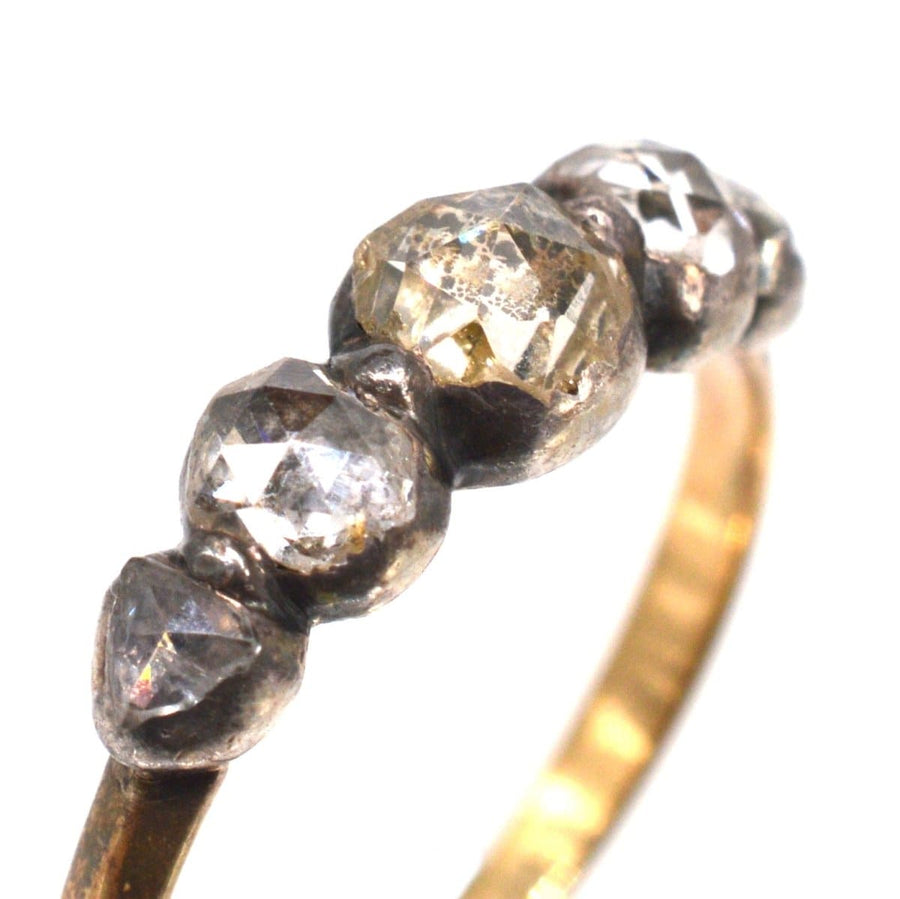 Regency five stone rose cut diamond ring in silver and gold, showcasing vintage elegance and charm.