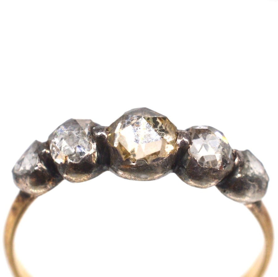 Regency silver and gold five stone rose cut diamond ring, showcasing antique elegance and vintage charm.