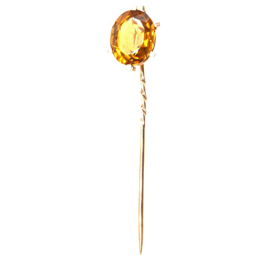 Retro 1940s 9ct gold tie pin featuring a large golden citrine stone in a claw setting.