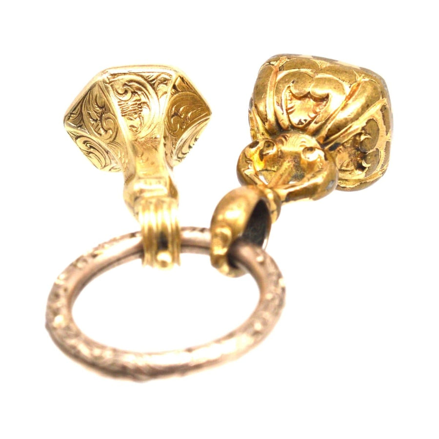 Two early Victorian gold cased seals with split ring, featuring a hexagon seal and a unique bloodstone seal.