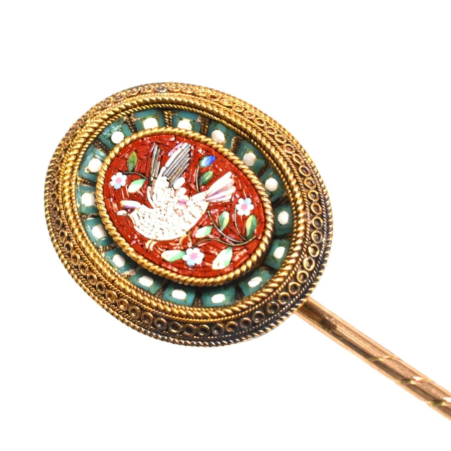 Victorian 15ct gold micromosaic tie pin featuring a dove and floral design, showcasing intricate craftsmanship.
