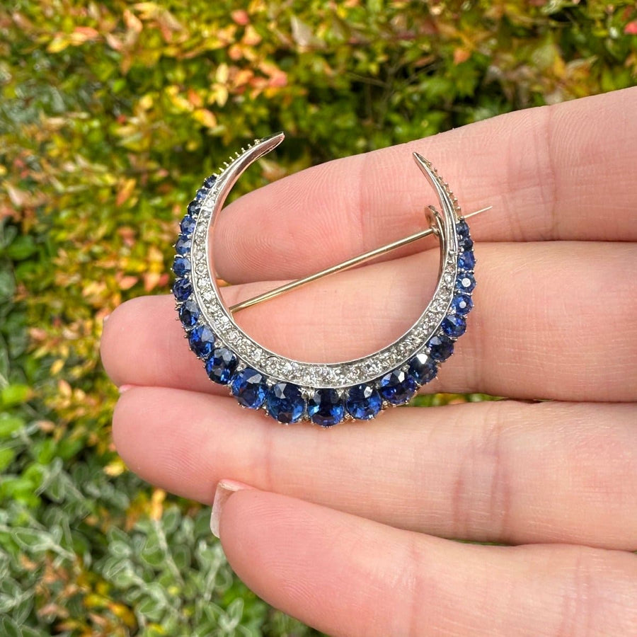 Victorian 18ct gold crescent brooch featuring sapphires and diamonds, potential pendant or hair ornament.