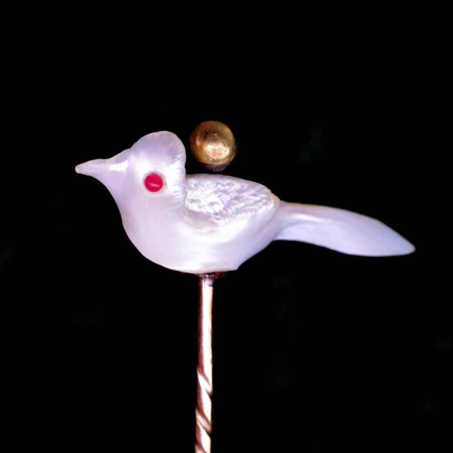 Victorian Baroque Pearl Bird Tie Pin showcasing unique keshi pearl craftsmanship with red accents.