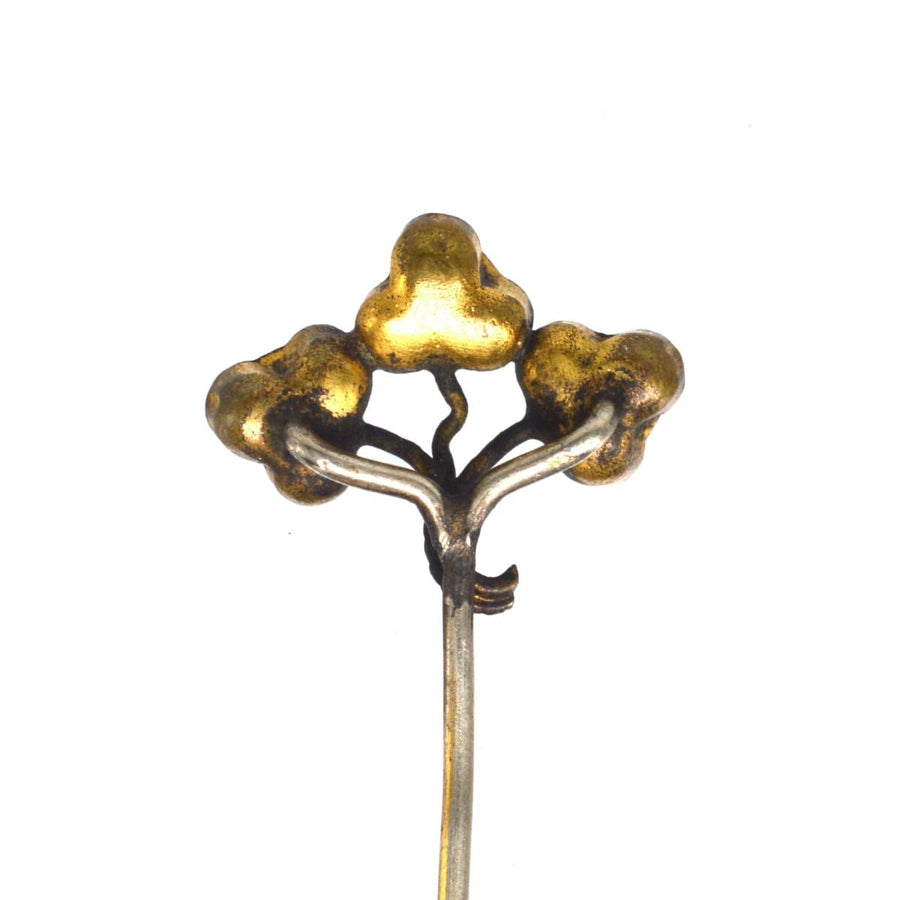 Victorian Irish tie pin featuring hand-carved bog oak trio of shamrocks, symbolizing sentiment and heritage.