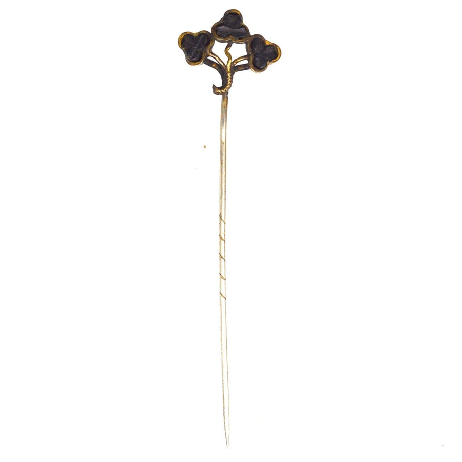 Victorian Irish bog oak tie pin featuring three beautifully hand-carved shamrocks, symbolizing heritage and sentimental value.