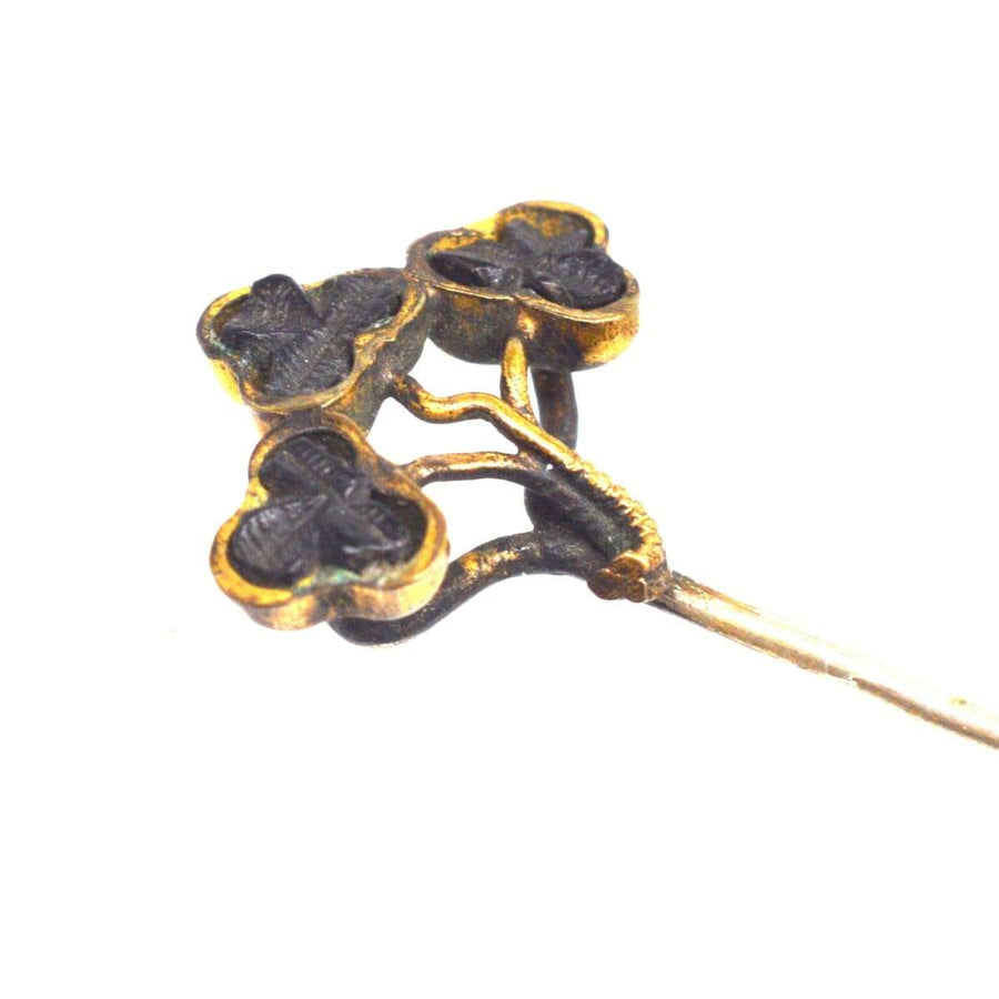 Victorian Irish tie pin featuring trio of shamrocks carved from ancient bog oak.