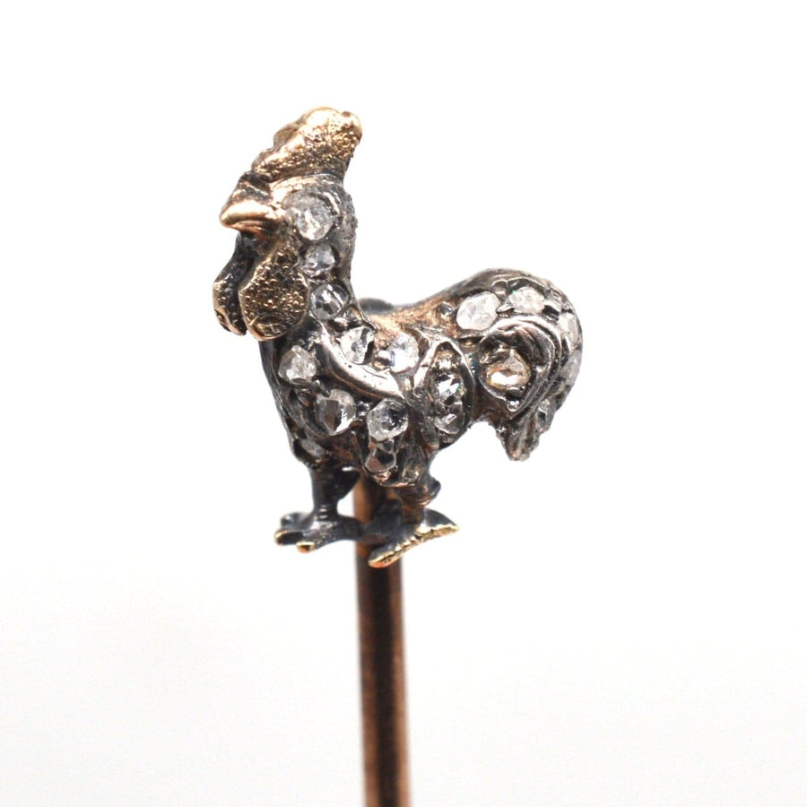 Victorian silver tie pin featuring a diamond cockerel, symbolizing bravery and prosperity, adorned with rose diamonds.