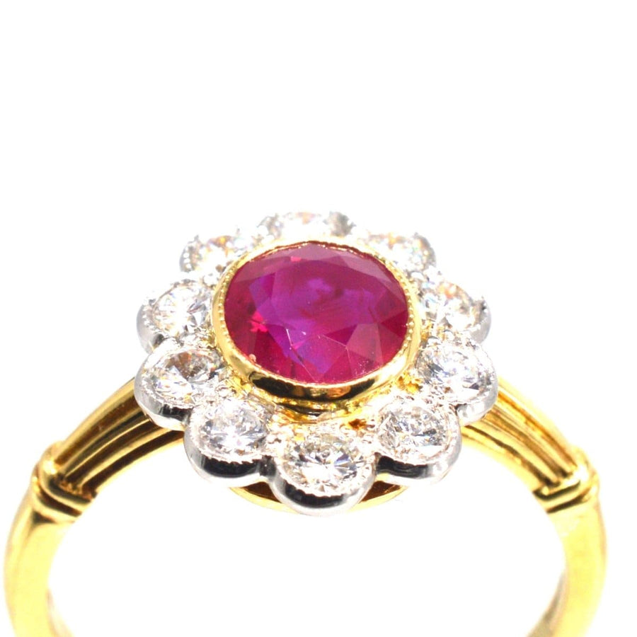 Vintage 18ct gold ring featuring a natural Burma ruby and a cluster of diamonds, ideal for engagement or July birthdays.