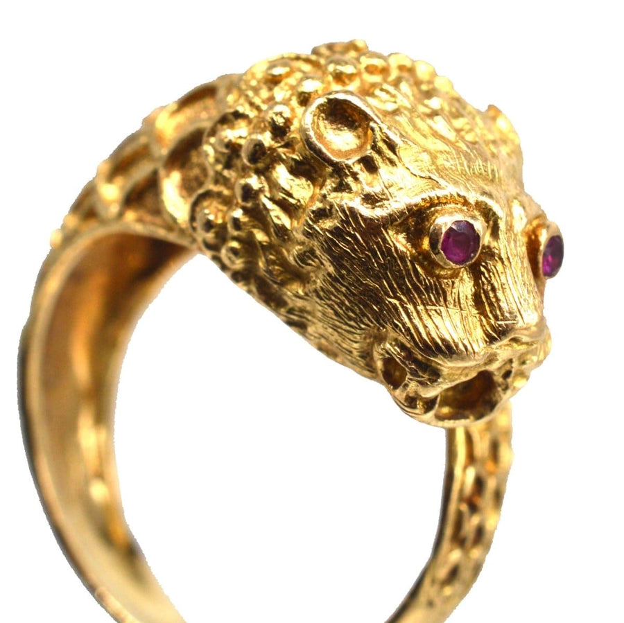 Vintage 18ct gold chimera ring featuring ruby eyes, inspired by Greek designer Lalaounis, reflecting antique elegance.