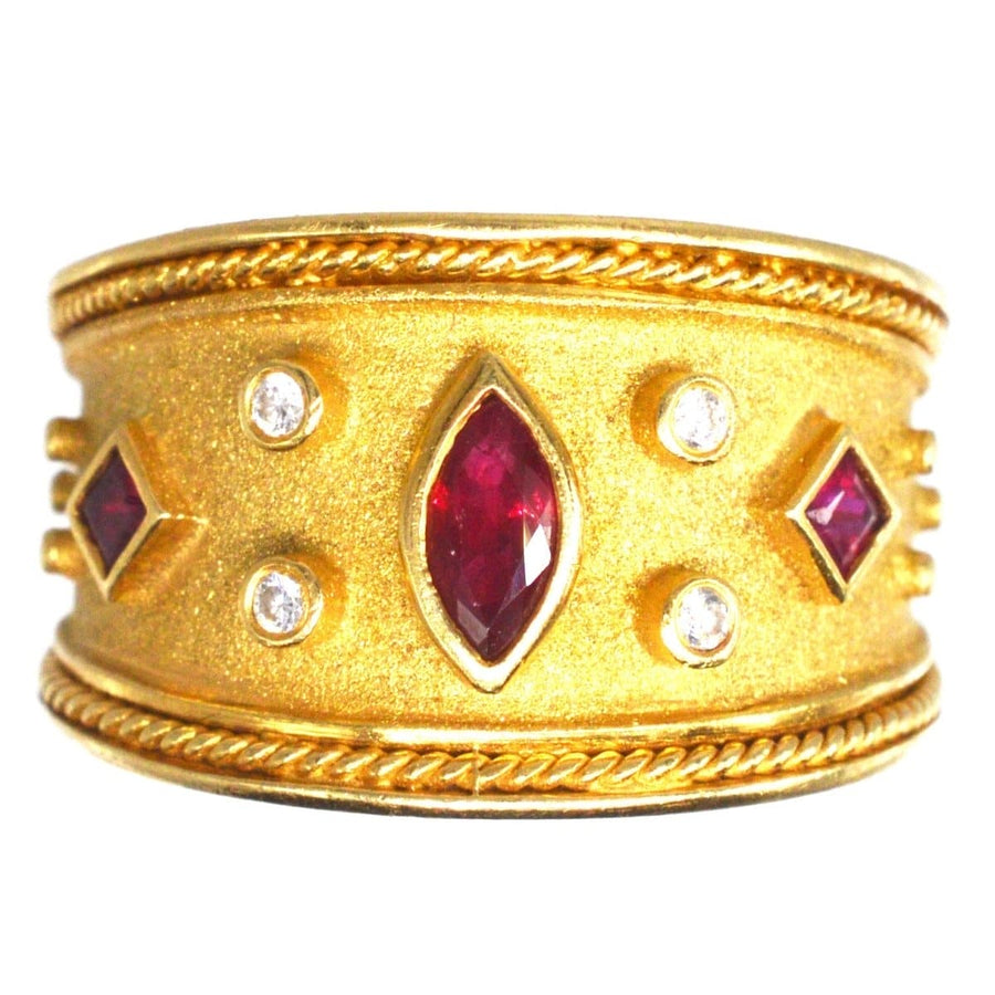 Vintage 18ct gold tapered ring with rubies and diamonds, inspired by Elizabeth Gage's unique design.
