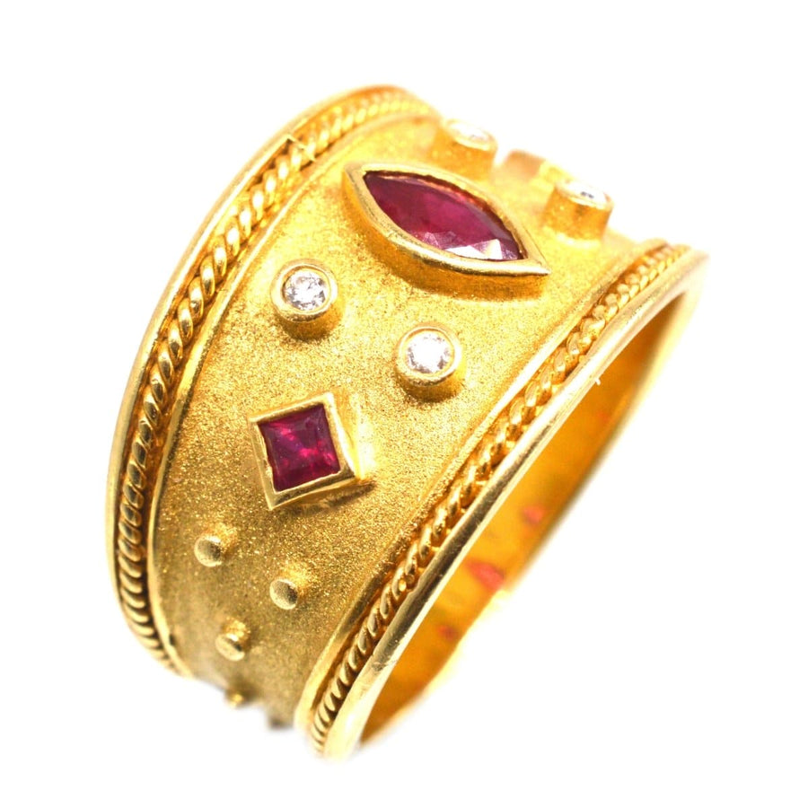 Vintage 18ct gold band ring featuring rubies and diamonds, inspired by Elizabeth Gage, perfect for engagement or special gifts.