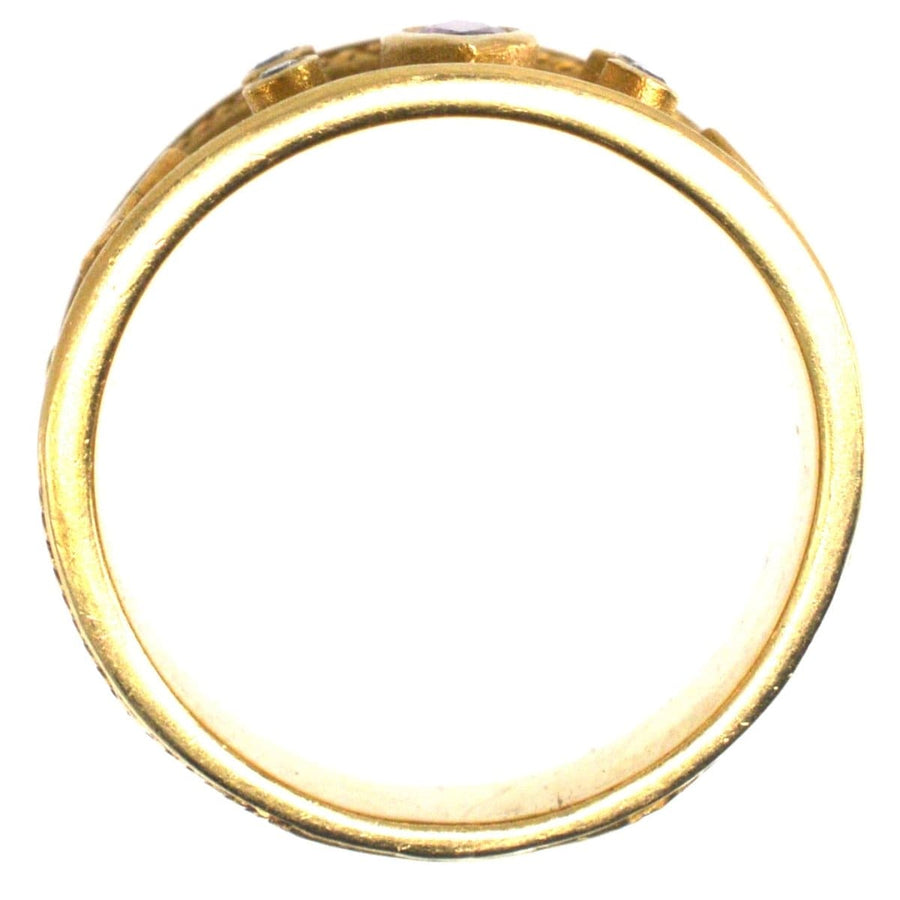 Vintage 18ct gold tapered Templar band ring featuring rubies and diamonds from the 1990s.