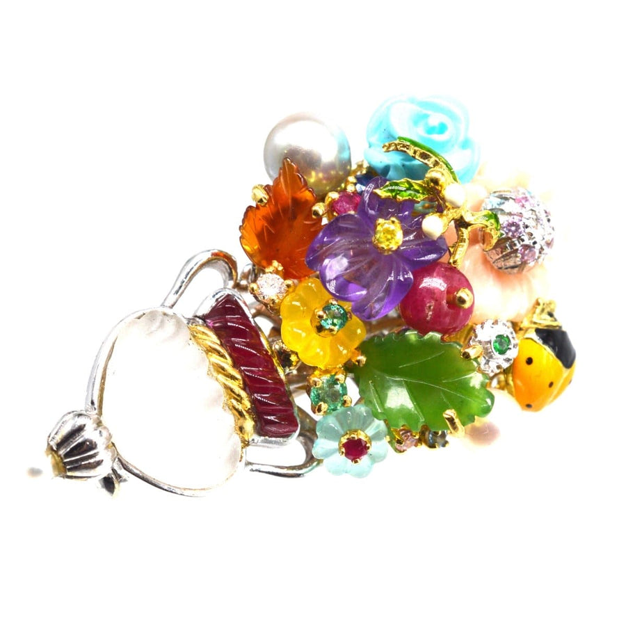 Vintage 18ct white gold brooch with colorful gem flowers and carved rock crystal vase by Santagostino.